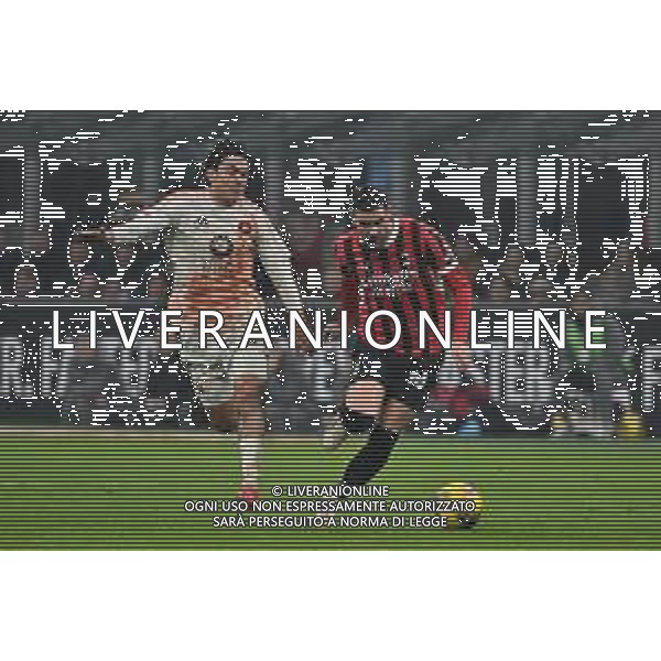 Milan vs Roma nella foto Paulo Dybala (Roma) e Theo Hernandez (Milan) Milano 05-02-2025 Stadio Giuseppe Meazza - San Siro Coppa Italia Frecciarossa - quarti di finale foto Roberto Garavaglia/Agenzia Aldo Liverani sas- AGENZIA ALDO LIVERANI SAS