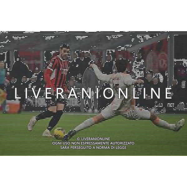 Milan vs Roma nella foto Theo Hernandez (Milan) serve a Tammy Abraham (Milan) la palla per il gol del 2 a 0 Milano 05-02-2025 Stadio Giuseppe Meazza - San Siro Coppa Italia Frecciarossa - quarti di finale foto Roberto Garavaglia/Agenzia Aldo Liverani sas- AGENZIA ALDO LIVERANI SAS