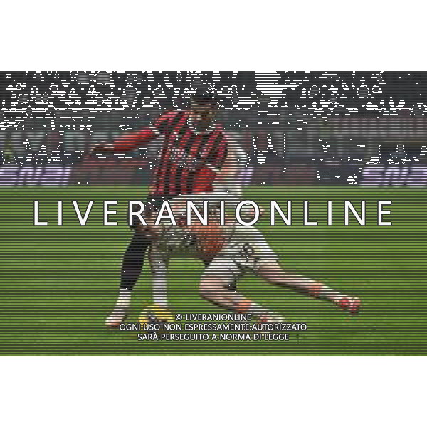 Milan vs Roma nella foto Theo Hernandez (Milan) e Alexis Saelemaekers (Roma) Milano 05-02-2025 Stadio Giuseppe Meazza - San Siro Coppa Italia Frecciarossa - quarti di finale foto Roberto Garavaglia/Agenzia Aldo Liverani sas- AGENZIA ALDO LIVERANI SAS
