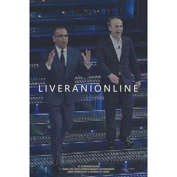 Festival Sanremo 2025 nella foto Carlo Conti e Roberto Benigni 75mo Festival della Canzone Italiana - Quarta Serata Teatro Ariston - Sanremo (IM) 14-02-2025 foto Roberto Garavaglia/agenzia Aldo Liverani sas