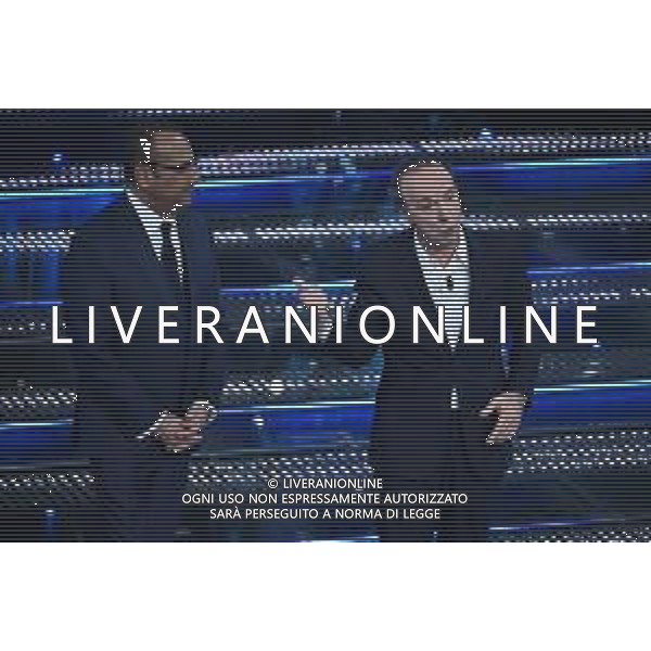 Festival Sanremo 2025 nella foto Carlo Conti e Roberto Benigni 75mo Festival della Canzone Italiana - Quarta Serata Teatro Ariston - Sanremo (IM) 14-02-2025 foto Roberto Garavaglia/agenzia Aldo Liverani sas