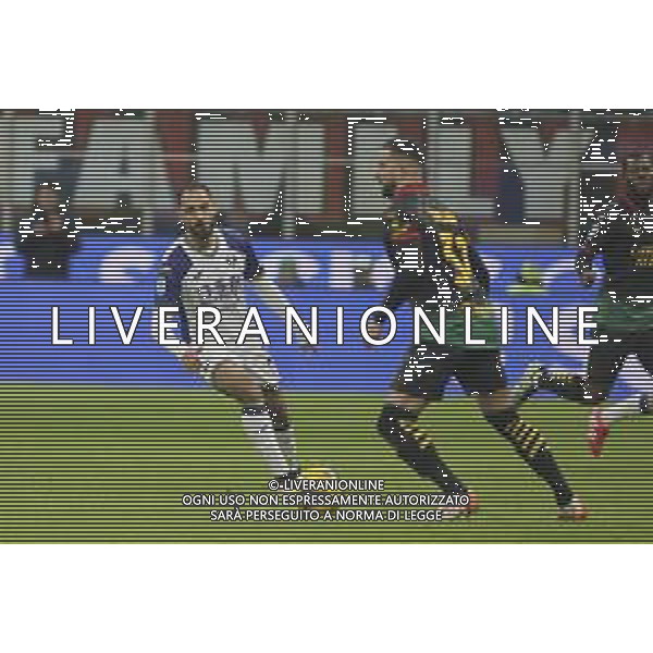 Grigoris Kastanos of Hellas Verona FC competes for the ball with Kyle Walker of AC Milan during Milan AC vs Hellas Verona FC, 25° Serie A Enilive 2024-25 game at G. Meazza - San Siro stadium in Milnao (MI), Italy, on February 15, 2025. (Photo by Davide Casentini) AG ALDO LIVERANI SAS