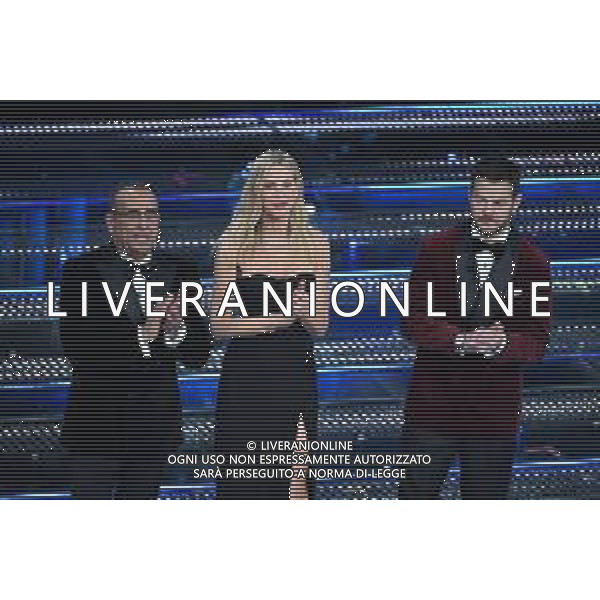 Festival Sanremo 2025 nella foto da SX Carlo Conti, Alessia Marcuzzi e Alessandro Cattelan 75mo Festival della Canzone Italiana - Quinta Serata Teatro Ariston - Sanremo (IM) 15-02-2025 foto Roberto Garavaglia/agenzia Aldo Liverani sas
