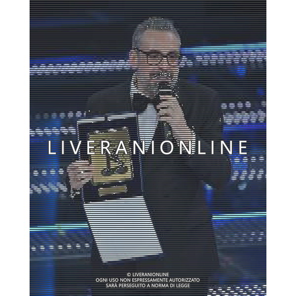 Festival Sanremo 2025 nella foto Brunori Sas vince il premio Sergio Bardotti per il miglior testo 75mo Festival della Canzone Italiana - Quinta Serata Teatro Ariston - Sanremo (IM) 15-02-2025 foto Roberto Garavaglia/agenzia Aldo Liverani sas
