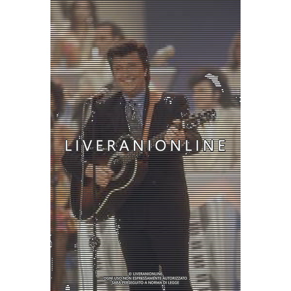 DIAP-RETROSPETTIVA BOBBY SOLO CANTANTE NELLA FOTO BOBBY SOLO NELL\'ANNO 1990 AG ALDO LIVERANI SAS