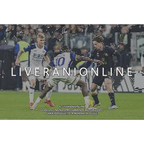 Kenan Yildiz of Juventus FC battle for the ball with Cheikh Niasse of Hellas Verona FC during Juventus FC vs Hellas Verona FC, 27° Serie A Enilive 2024-25 game at Allianz Stadium in Torino (TO), Italy, on March 03, 2025. (Photo by Davide Casentini)- AG ALDO LIVERANI SAS