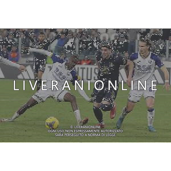 Dusan Vlahovic of Juventus FC battle for the ball with Cheikh Niasse of Hellas Verona FC and Daniele Ghilardi of Hellas Verona FC during Juventus FC vs Hellas Verona FC, 27° Serie A Enilive 2024-25 game at Allianz Stadium in Torino (TO), Italy, on March 03, 2025. (Photo by Davide Casentini)- AG ALDO LIVERANI SAS