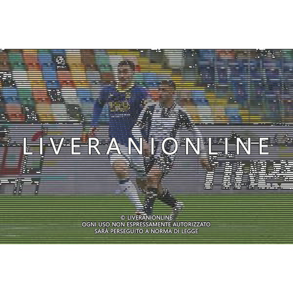 Alexis Sanchez of Udinese FC battle for the ball with Diego Coppola of Hellas Verona FC during Udinese Calcio vs Hellas Verona FC, 29° Serie A Enilive 2024-25 game at Bluenergy stadium in Udine (UD), Italy, on March 15, 2025. (Photo by Davide Casentini) - AGENZIA ALDO LIVERANI SAS