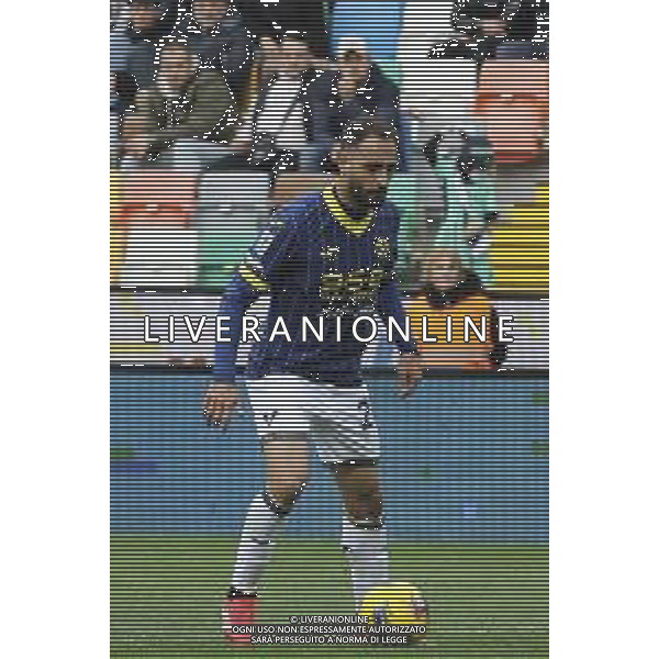 Grigoris Kastanos of Hellas Verona FC play the ball during Udinese Calcio vs Hellas Verona FC, 29° Serie A Enilive 2024-25 game at Bluenergy stadium in Udine (UD), Italy, on March 15, 2025. (Photo by Davide Casentini)- AGENZIA ALDO LIVERANI SAS