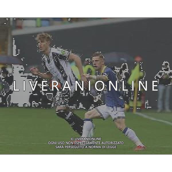 Tomas Suslov of Hellas Verona FC competes for the ball with Thomas Thiesson Kristensen of Udinese FC during Udinese Calcio vs Hellas Verona FC, 29° Serie A Enilive 2024-25 game at Bluenergy stadium in Udine (UD), Italy, on March 15, 2025. (Photo by Davide Casentini)- AGENZIA ALDO LIVERANI SAS