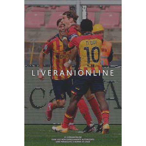 TVEM April 06, 2025 Lecce, Italy - US Lecce vs Venezia FC - Italian soccer serie A 2024/25 - Via Del Mare Stadium. In the pic: Federico Baschirotto of US Lecce celebrates after scoring a goal with Þorir Johann Helgason of US Lecce and Konan Ignace Jocelyn N\'Dri of US Lecce ©TVEM Emmanuele Mastrodonato - AGENZIA ALDO LIVERANI SAS