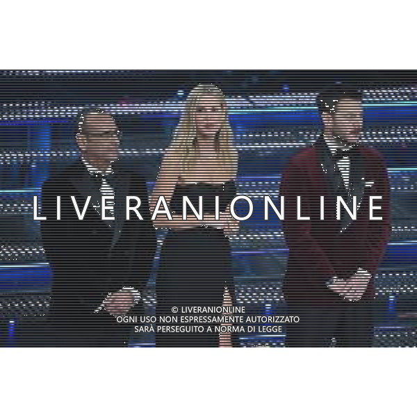 Festival Sanremo 2025 nella foto da SX Carlo Conti, Alessia Marcuzzi e Alessandro Cattelan 75mo Festival della Canzone Italiana - Quinta Serata Teatro Ariston - Sanremo (IM) 15-02-2025 foto Roberto Garavaglia/agenzia Aldo Liverani sas