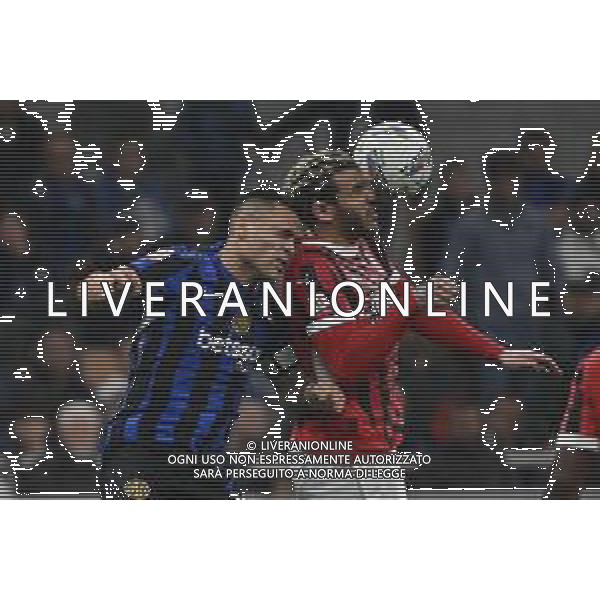 Inter vs Milan nella foto Lautaro Martinez (Inter) e Theo Hernandez (Milan) Milano 23-04-2025 Stadio Giuseppe Meazza - San Siro Coppa Italia Frecciarossa - semifinale gara di ritorno foto Roberto Garavaglia/Agenzia Aldo Liverani sas