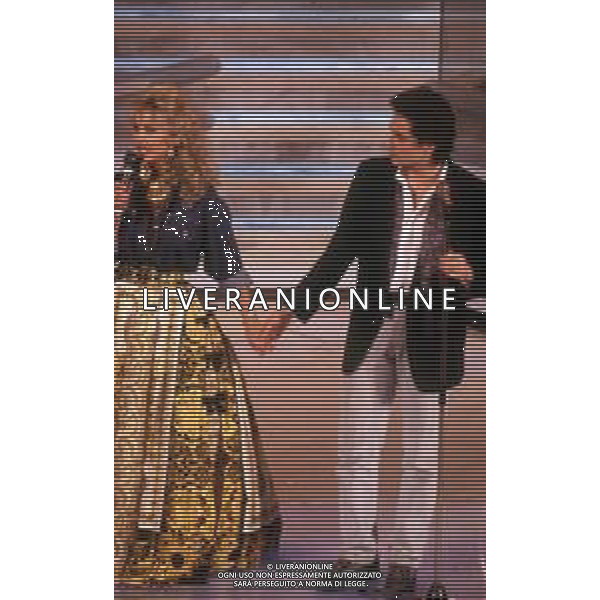 DIAP-RETROSPETTIVA BARBARA BOUCHET ATTRICE NELLA FOTO BARBARA BOUCHET CON MASSIMO MODUGNO A SANREMO NELL\'ANNO 1992 AG ALDO LIVERANI SAS
