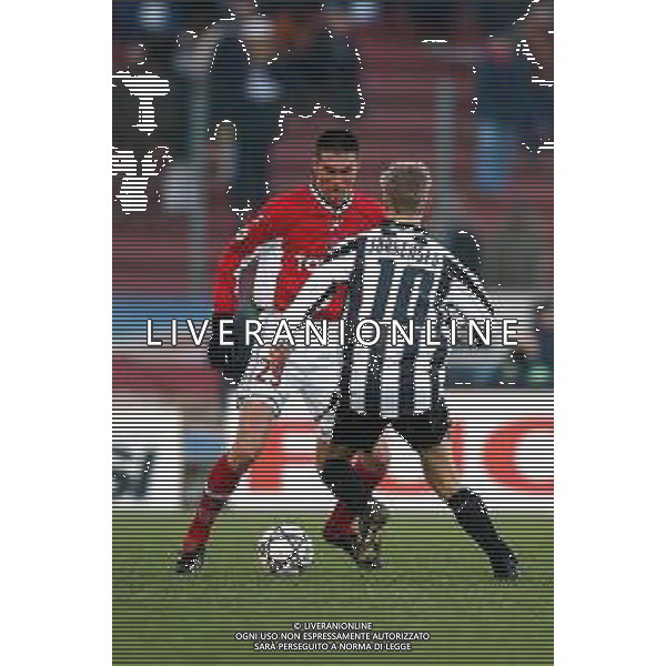 DIG- UDINESE - PERUGIA CAMPIONATO CALCIO SERIE A 12 GENNAIO 2003 - RISULTATO 0-0 NELLA FOTO MARTIN JORGENSEN E ANDREA CARACCIOLO AGENZIA ALDO LIVERANI SAS