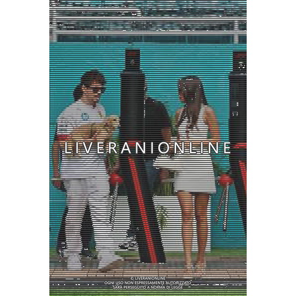 (L to R): Charles Leclerc (MON) Ferrari with his girlfriend Alexandra Saint Mleux (ITA) and Leo the dog. 03.05.2025. Formula 1 World Championship, Rd 6, Miami Grand Prix, Miami, Florida, USA, Sprint and Qualifying Day. - www.xpbimages.com, EMail: requests@xpbimages.com © Copyright: Moy / XPB Images ONLY ITALY-AG ALDO LIVERANI SAS