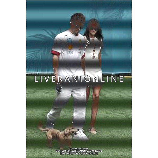 (L to R): Charles Leclerc (MON) Ferrari with his girlfriend Alexandra Saint Mleux (ITA) and Leo the dog. 03.05.2025. Formula 1 World Championship, Rd 6, Miami Grand Prix, Miami, Florida, USA, Sprint and Qualifying Day. - www.xpbimages.com, EMail: requests@xpbimages.com © Copyright: Moy / XPB Images ONLY ITALY-AG ALDO LIVERANI SAS
