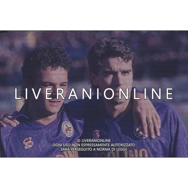 DIAP-RETROSPETTIVA STEFANO BORGONOVO CALCIATORE NELLA FOTO STEFANO BORGONOVO CON LA MAGLIA DELLA FIORENTINA CALCIO E ROBERTO BAGGIO AG ALDO LIVERANI SAS 