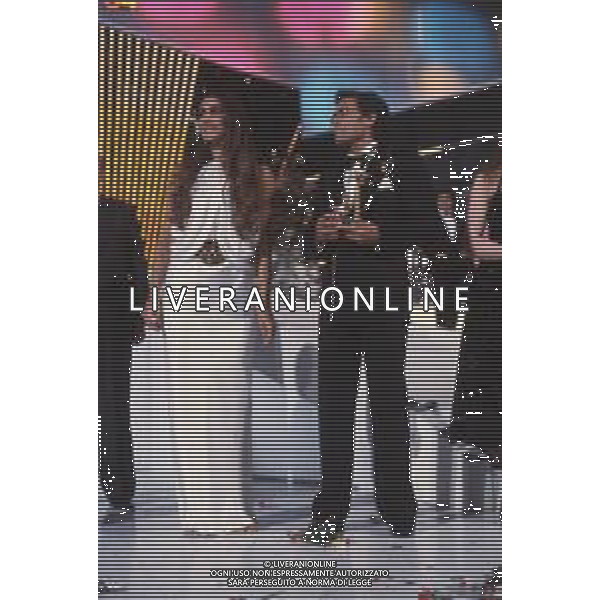 DIAP-RETROSPETTIVA ROMINA POWER E ALBANO CARRISI CANTANTI NELLA FOTO ROMINA POWER CON ALBANO CARRISI AL FESTIVAL DI SANREMO NELL\'ANNO 1984 FOTO ENRICO LIVERANI-AG ALDO LIVERANI SAS 
