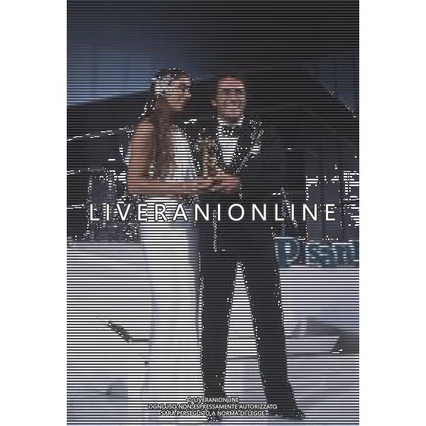 DIAP-RETROSPETTIVA ROMINA POWER E ALBANO CARRISI CANTANTI NELLA FOTO ROMINA POWER CON ALBANO CARRISI AL FESTIVAL DI SANREMO NELL\'ANNO 1984 FOTO ENRICO LIVERANI-AG ALDO LIVERANI SAS 