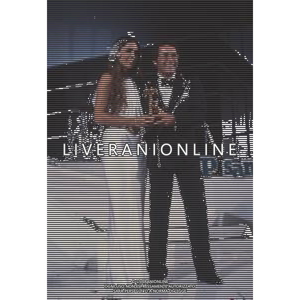 DIAP-RETROSPETTIVA ROMINA POWER E ALBANO CARRISI CANTANTI NELLA FOTO ROMINA POWER CON ALBANO CARRISI AL FESTIVAL DI SANREMO NELL\'ANNO 1984 FOTO ENRICO LIVERANI-AG ALDO LIVERANI SAS  
