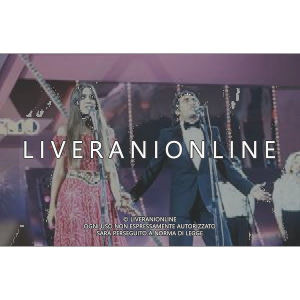 DIAP-RETROSPETTIVA ROMINA POWER E ALBANO CARRISI CANTANTI NELLA FOTO ROMINA POWER CON ALBANO CARRISI AL FESTIVAL DI SANREMO NELL\'ANNO 1982 FOTO ENRICO LIVERANI-AG ALDO LIVERANI SAS 