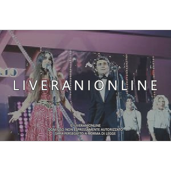 DIAP-RETROSPETTIVA ROMINA POWER E ALBANO CARRISI CANTANTI NELLA FOTO ROMINA POWER CON ALBANO CARRISI AL FESTIVAL DI SANREMO NELL\'ANNO 1982 FOTO ENRICO LIVERANI-AG ALDO LIVERANI SAS 
