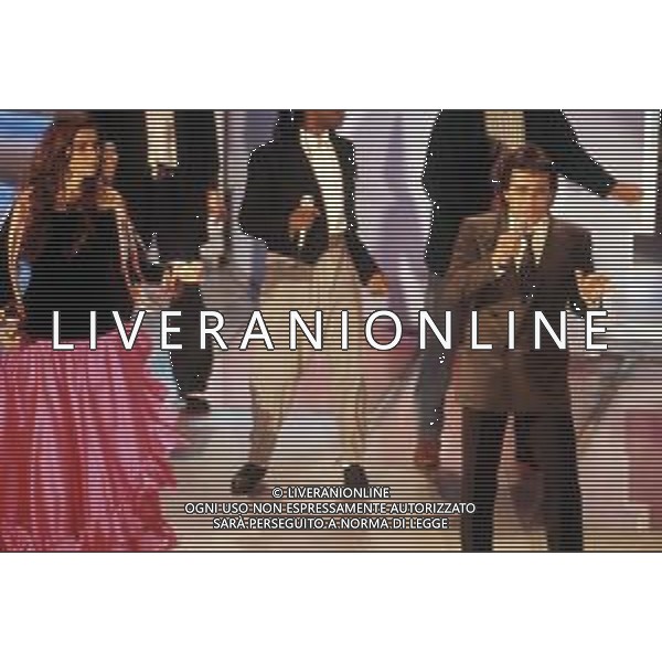 DIAP-RETROSPETTIVA ALBANOCARRISI E ROMINA POWER CANTANTI NELLA FOTO ALBANO CARRISI E ROMINA POWER A SANREMO NELL\'ANNO 1989 AG ALDO LIVERANI SAS
