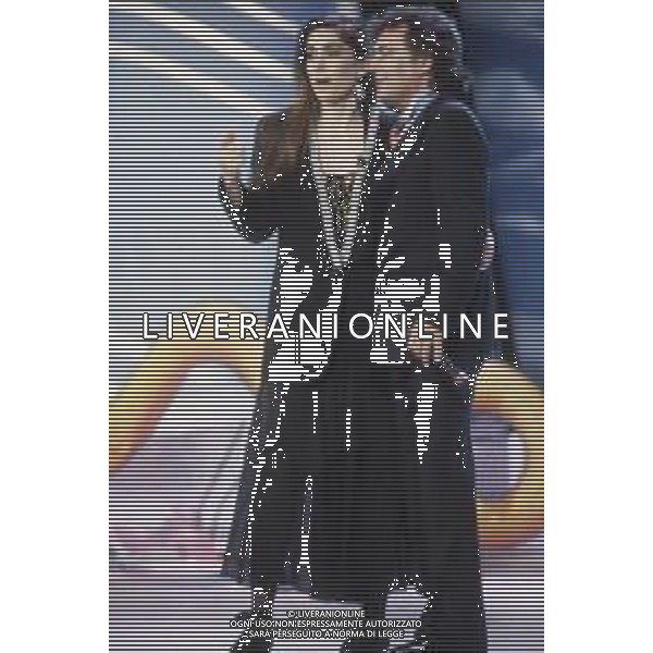 DIAP-RETROSPETTIVA ALBANOCARRISI E ROMINA POWER CANTANTI NELLA FOTO ALBANO CARRISI E ROMINA POWER A SANREMO NELL\'ANNO 1989 AG ALDO LIVERANI SAS