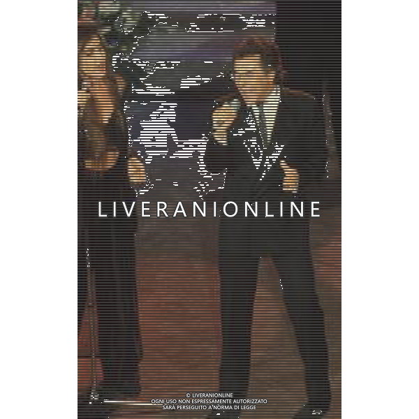 DIAP-RETROSPETTIVA ALBANO CARRISI E ROMINA POWER CANTANTI NELLA FOTO ALBANO CARRISI E ROMINA POWER AL FESTIVAL DI SANREMO NELL\'ANNO 1991 AG ALDO LIVERANI SAS