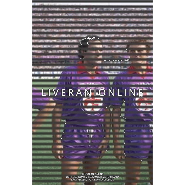 DIAP-RETROSPETTIVA ANTONELLO CUCCUREDDU CALCIATORE NELLA FOTO ANTONELLO CUCCUREDDU CON L MAGLIA DELL FIORENTINA CALCIO E PIETRO VIERCHOWOD AG ALDO LIVERANI SAS 