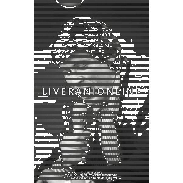 NEG-.RETROSPETTIVA GIANNI MORANDI CANTANTE NELLA FOTO GIANNI MORANDI AL FESTIVAL DI SAINT VINCENT NELL\'ANNO 1987 AG ALDO LIVERANI SAS