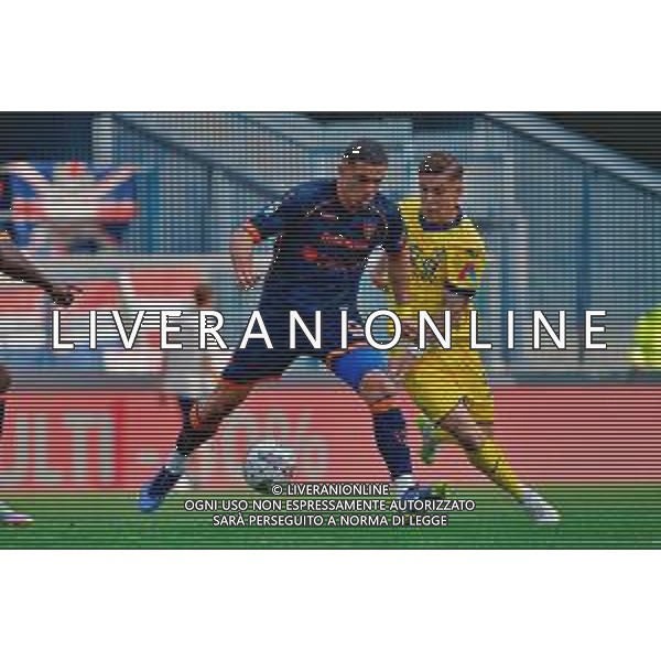 TVEM May 11, 2025 Verona, Italy - Hellas Verona vs US Lecce - Italian soccer serie A 2024/25 - Marcantonio Bentegodi Stadium. In the pic: Nikola Krstovic of US Lecce in action against Tomas Suslov of Hellas Verona foto emmanuele mastrodonato-ag aldo liverani sas