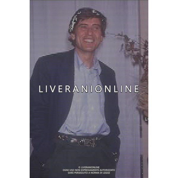 DIAP-RETROSPETTIVA GIANNI MORANDI CANTANTE NELLA FOTO GIANNI MORANDI NELL\'ANNO 1990 AG ALDO LIVERANI SAS 