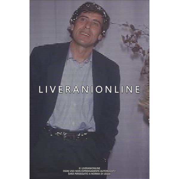 DIAP-RETROSPETTIVA GIANNI MORANDI CANTANTE NELLA FOTO GIANNI MORANDI NELL\'ANNO 1990 AG ALDO LIVERANI SAS 