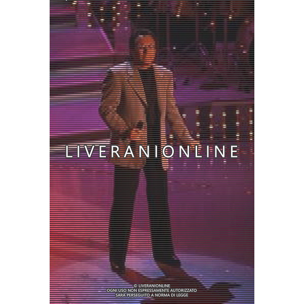DIAP-RETROSPETTIVA ALBANO CARRISI CANTANTE NELLA FOTO ALBANO CARRISI AL FESTIVAL DI SANREMO NELL\'ANNO 1996 AG ALDO LIVERANI SAS