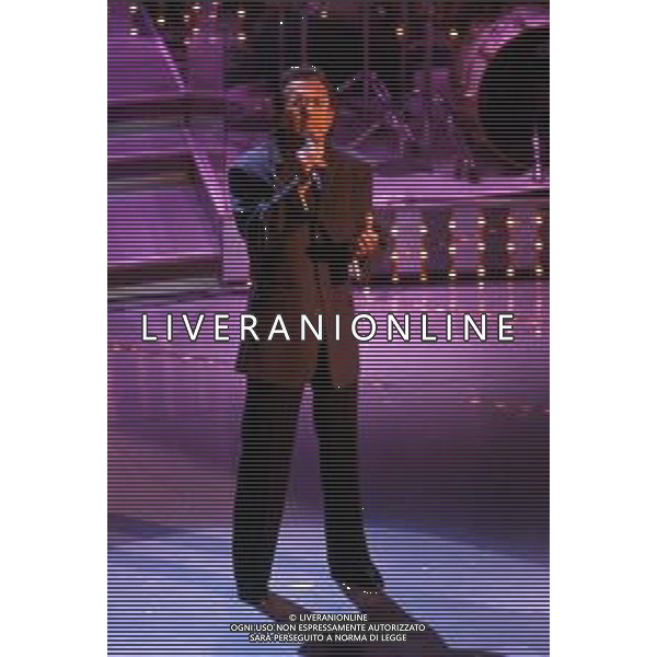 DIAP-RETROSPETTIVA ALBANO CARRISI CANTANTE NELLA FOTO ALBANO CARRISI AL FESTIVAL DI SANREMO NELL\'ANNO 1996 AG ALDO LIVERANI SAS