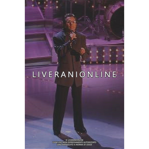 DIAP-RETROSPETTIVA ALBANO CARRISI CANTANTE NELLA FOTO ALBANO CARRISI AL FESTIVAL DI SANREMO NELL\'ANNO 1996 AG ALDO LIVERANI SAS
