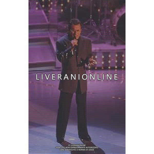 DIAP-RETROSPETTIVA ALBANO CARRISI CANTANTE NELLA FOTO ALBANO CARRISI AL FESTIVAL DI SANREMO NELL\'ANNO 1996 AG ALDO LIVERANI SAS