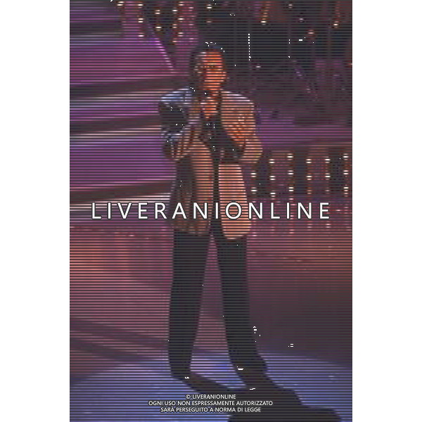 DIAP-RETROSPETTIVA ALBANO CARRISI CANTANTE NELLA FOTO ALBANO CARRISI AL FESTIVAL DI SANREMO NELL\'ANNO 1996 AG ALDO LIVERANI SAS
