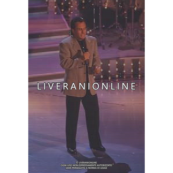 DIAP-RETROSPETTIVA ALBANO CARRISI CANTANTE NELLA FOTO ALBANO CARRISI AL FESTIVAL DI SANREMO NELL\'ANNO 1996 AG ALDO LIVERANI SAS