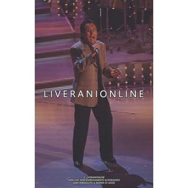 DIAP-RETROSPETTIVA ALBANO CARRISI CANTANTE NELLA FOTO ALBANO CARRISI AL FESTIVAL DI SANREMO NELL\'ANNO 1996 AG ALDO LIVERANI SAS