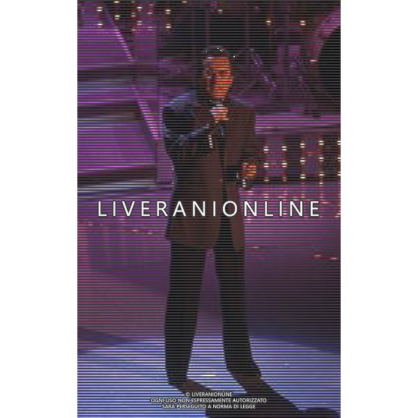 DIAP-RETROSPETTIVA ALBANO CARRISI CANTANTE NELLA FOTO ALBANO CARRISI AL FESTIVAL DI SANREMO NELL\'ANNO 1996 AG ALDO LIVERANI SAS