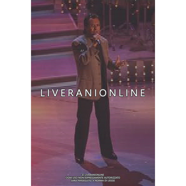 DIAP-RETROSPETTIVA ALBANO CARRISI CANTANTE NELLA FOTO ALBANO CARRISI AL FESTIVAL DI SANREMO NELL\'ANNO 1996 AG ALDO LIVERANI SAS