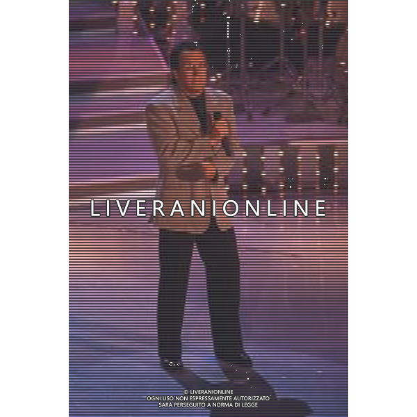 DIAP-RETROSPETTIVA ALBANO CARRISI CANTANTE NELLA FOTO ALBANO CARRISI AL FESTIVAL DI SANREMO NELL\'ANNO 1996 AG ALDO LIVERANI SAS