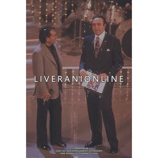 DIAP-RETROSPETTIVA ALBANO CARRISI CANTANTE NELLA FOTO ALBANO CARRISI AL FESTIVAL DI SANREMO NELL\'ANNO 1996 AG ALDO LIVERANI SAS