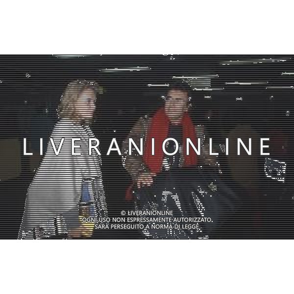 DIAP-RETROSPETTIVA ALBANO CARRISI CANTANTE NELLA FOTO ALBANO CARRISI CON LA FIGLIA YLENIA E ALBERTO TOMBA IN AEROPORTO A MILANO AG ALDO LIVERANI SAS