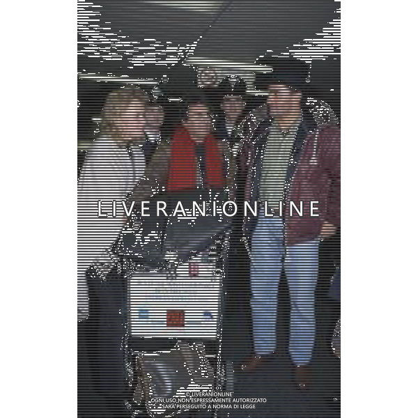 DIAP-RETROSPETTIVA ALBANO CARRISI CANTANTE NELLA FOTO ALBANO CARRISI CON LA FIGLIA YLENIA E ALBERTO TOMBA IN AEROPORTO A MILANO AG ALDO LIVERANI SAS