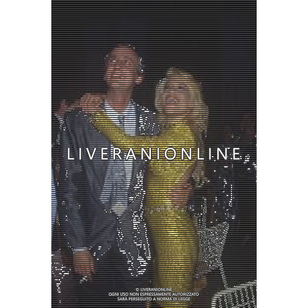 DIA- RETROSPETTIVA PIERO BADALONI GIORNALISTA NELLA FOTO PIERO BADALONI CON LA BALLERINA HEATHER PARISI NELL’ANNO 1986 AGENZIA ALDO LIVERANI SAS