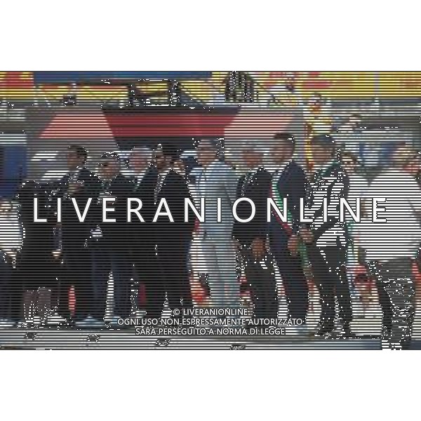 IMOLA 18 05 2025 DOMENICA AUTODROMO ENZO E DINO FERRARI DOMENICA FORMULA 1 GRAN PREMIO DEL MADE IN ITALY E DELL\'EMILIA ROMAGNA - INNO NAZIONALE NELLA FOTO DA DX MATTEO ZOPPAS PRESIDENTE AGENZIA ICE, SINDACO DI IMOLA MARCO PANIERI, MINISTRO ALLO SPORT ANDREA ABODI, STEFANO DOMENICALI PRESIDENTE F1, MOHAMMED BEN SULAYEM PRESIDENTE FIA,TULLIO DEL SETTE COMMISSARIO STRAORDINARIO ACI E MICHELE DE PASCALE PRESIDENTE REGIONE EMILIA ROMAGNA ©SANNA - AGENZIA ALDO LIVERANI SAS